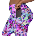 Load image into Gallery viewer, Closeup of the legging's side pocket, the model is pulling a phone out. There is plenty of room in the pocket for the phone to fit comfortably.