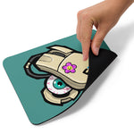 Load image into Gallery viewer, Hand holding up a corner of the mousepad, revealing the non-slip rubber base.
