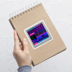 Load image into Gallery viewer, Sticker on a notebook.
