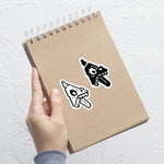 Load image into Gallery viewer, Sticker on a notebook.
