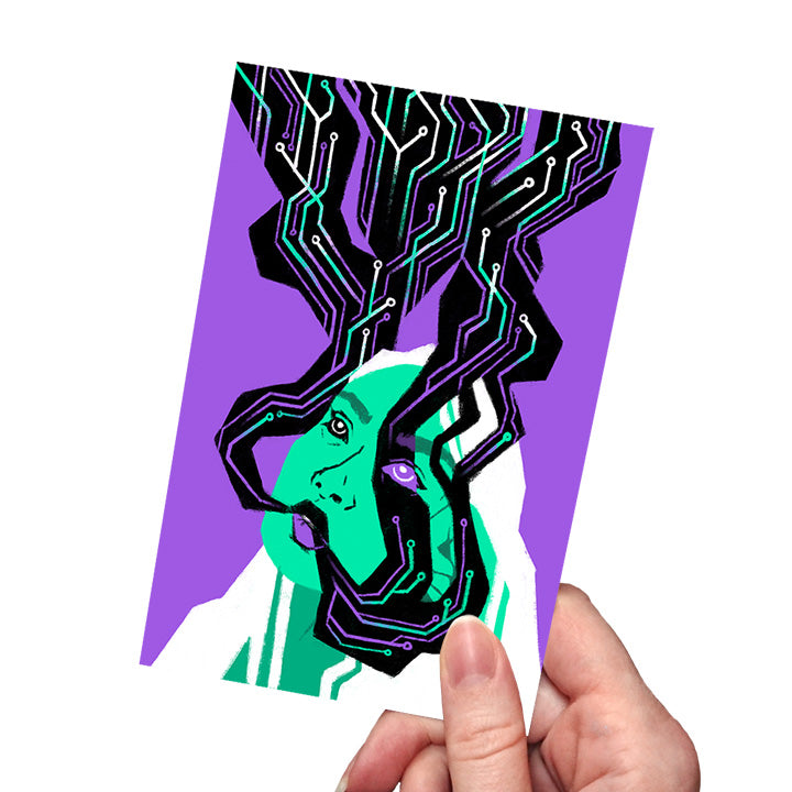 A hand holding a "Glitch Witch" mini art print