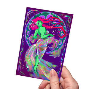 A hand holding a "Dance" mini art print